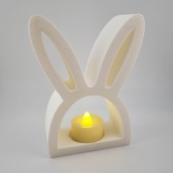 3D printet kanin fyrfadsstage med LED tea light p� tr�bord